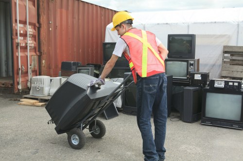 Operatives wearing PPE while handling commercial waste